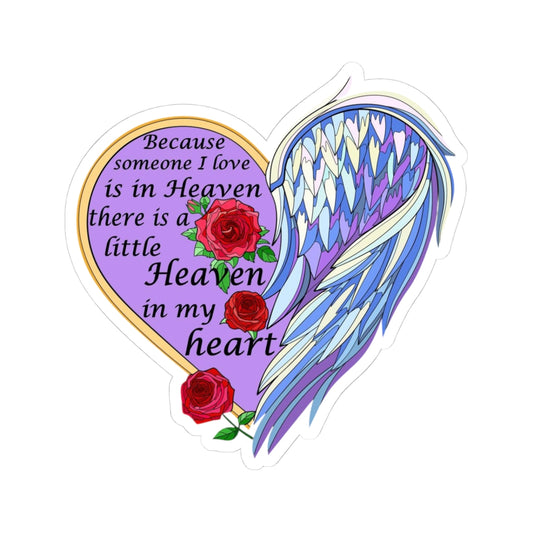 Heart-shaped sticker with angel wing, roses, and text on a white background