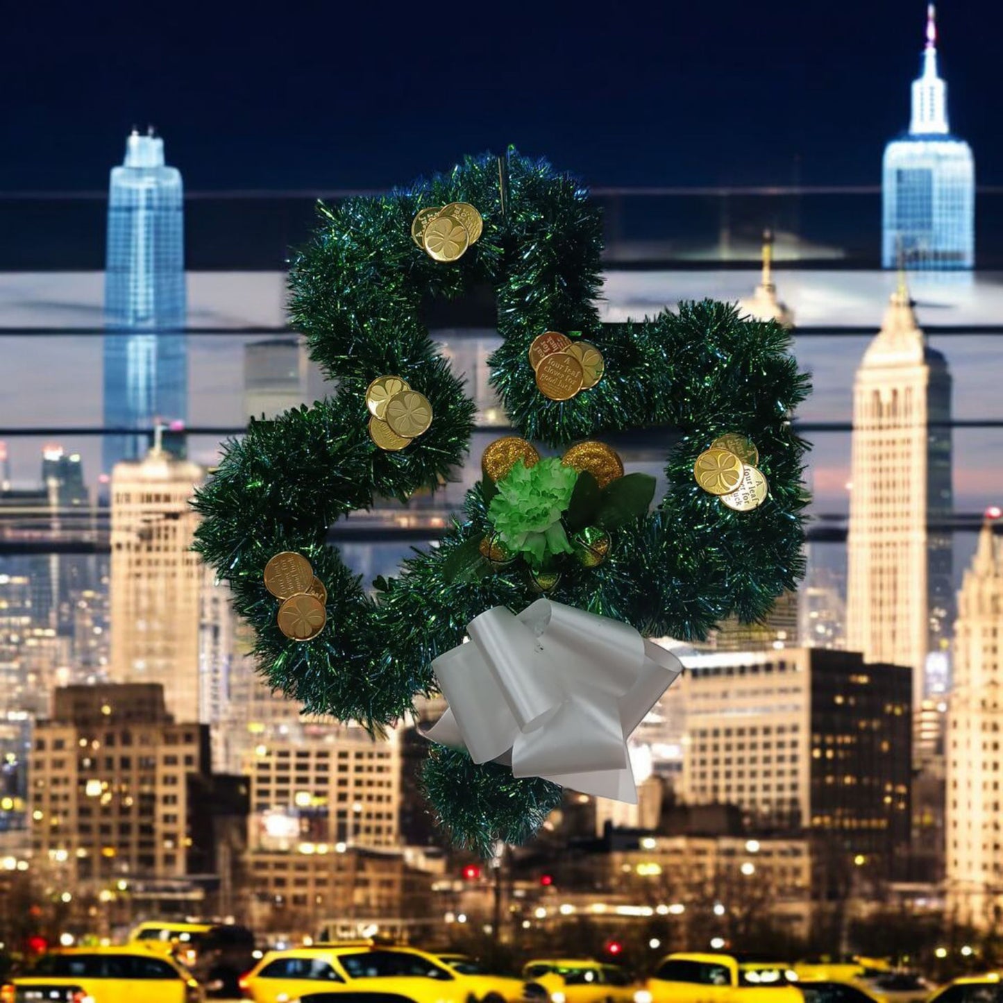 Decorative wreath with gold coins against a city skyline at night