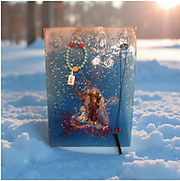 Decorative notebook with characters on a snowy background